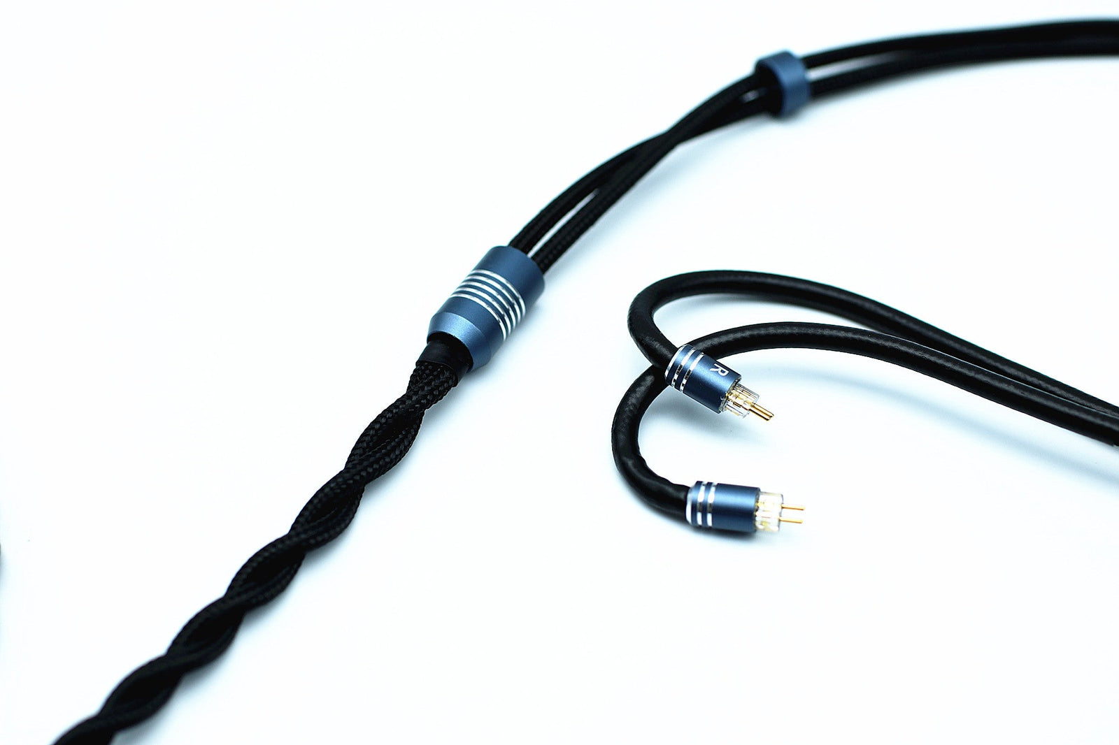 Null Audio earphone cable Y-split and 2-pin IEM connectors on a white background